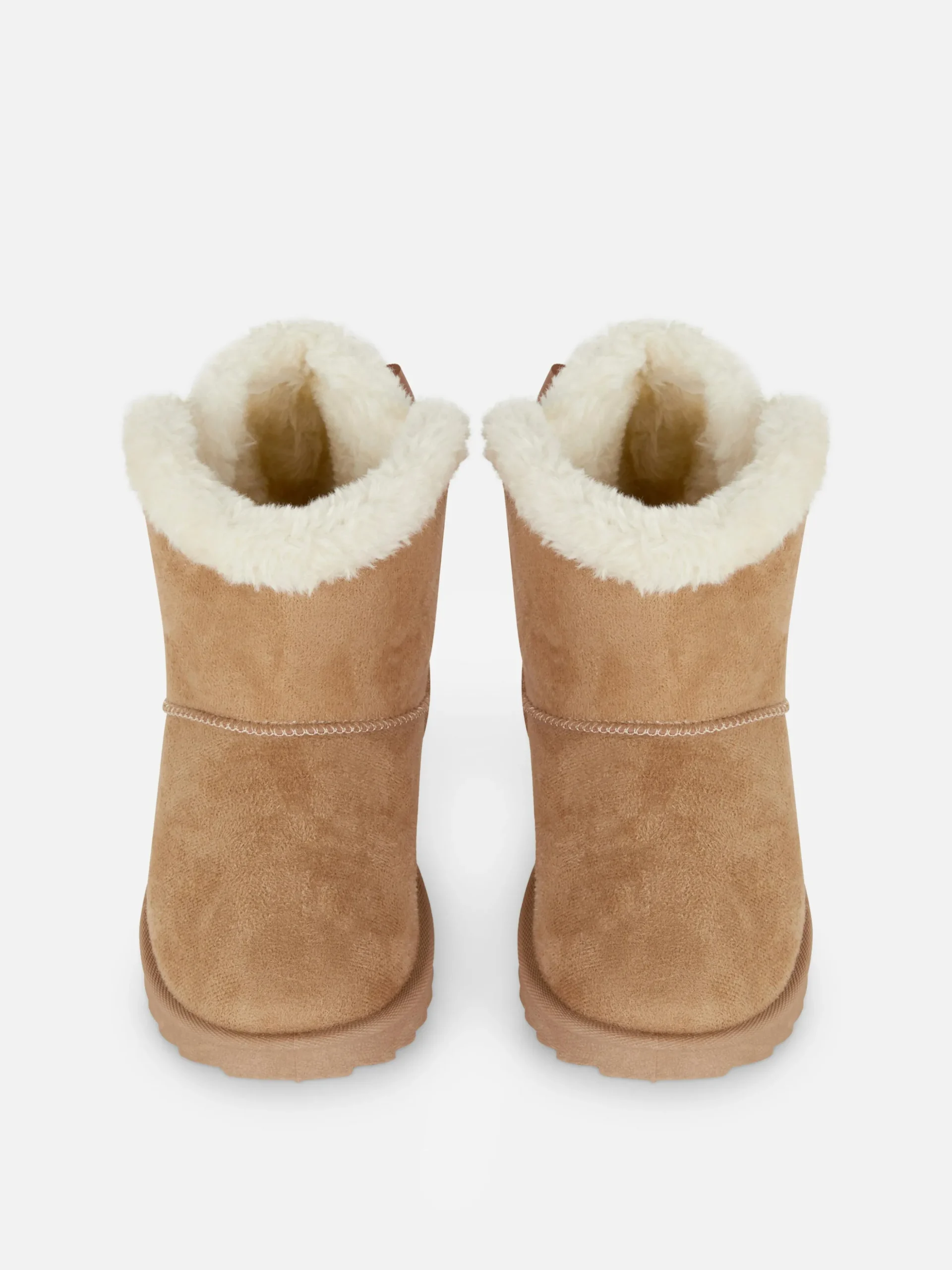 Botas Imitação Pelo Detalhe Laço