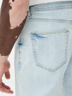 Calças Ganga Elásticas Corte Perna Direita