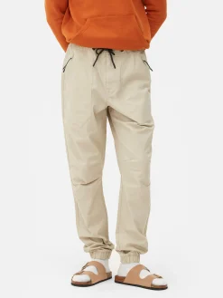 Calças Treino Elásticas Corte Folgado