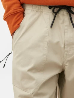 Calças Treino Elásticas Corte Folgado