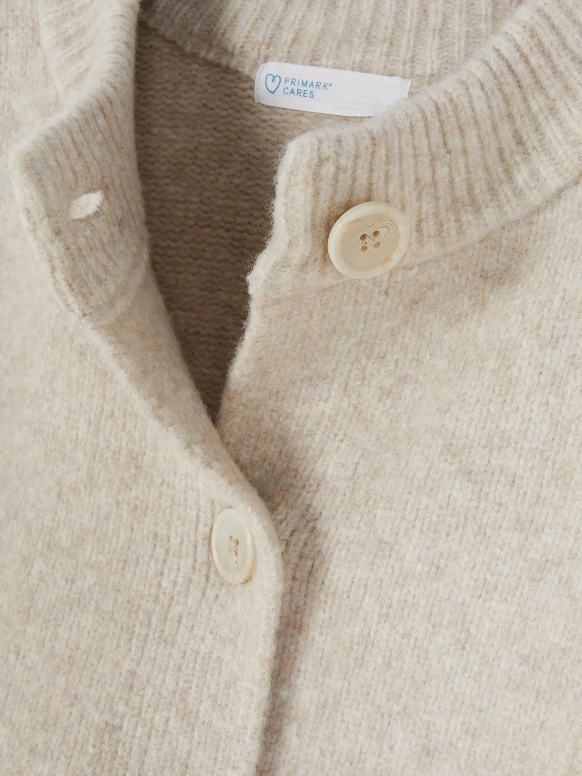 Casaco Malha Folgado Botões Frente