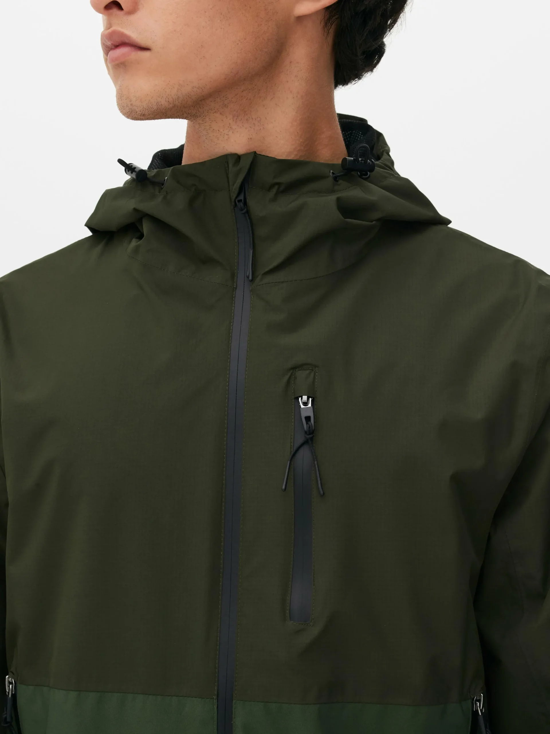 Impermeável Multibolsos Bloco Cor