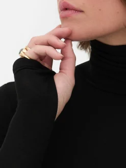 Top Manga Comprida Gola Alta Rita Ora